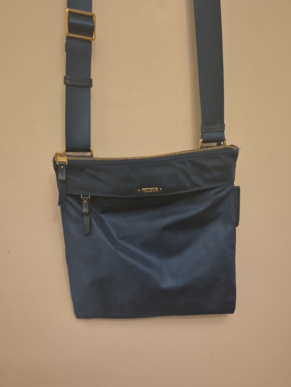 Tumi teal blue Messenger Bag with Gold Hardware